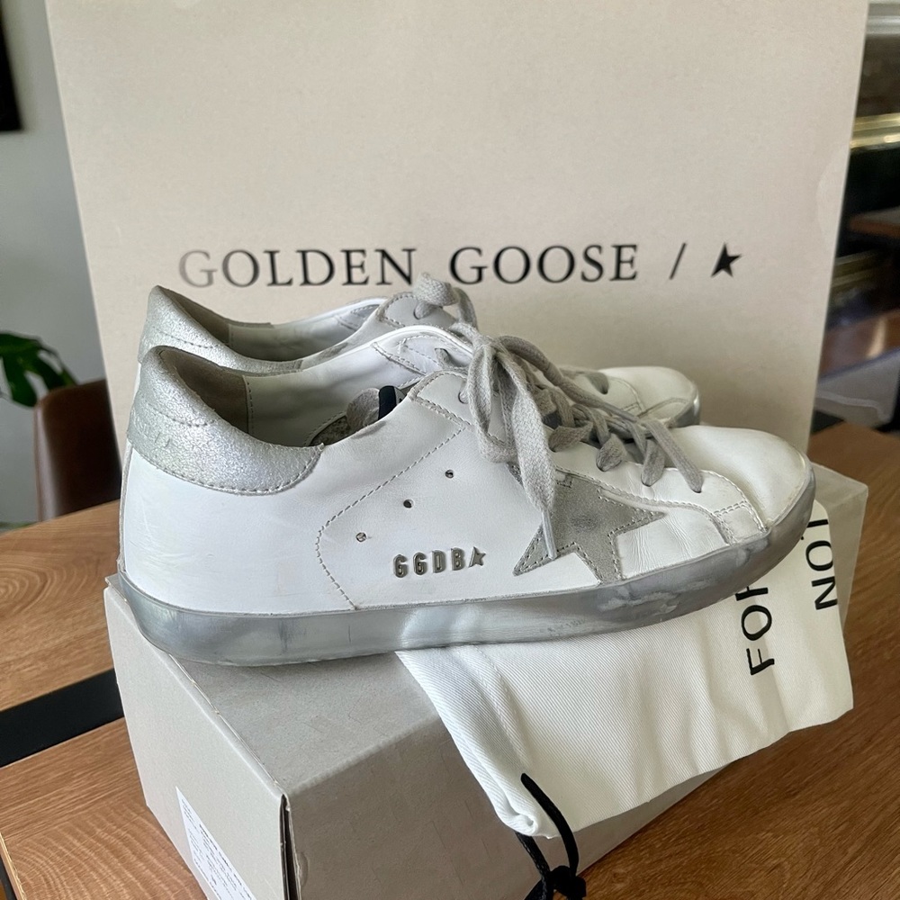 Women's Super Star sneakers in white/silver.